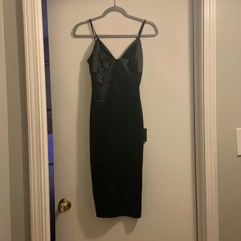Lulus little black dress- new with tags. Perfect for holiday parties!